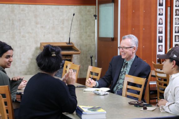 Dean talks with students 