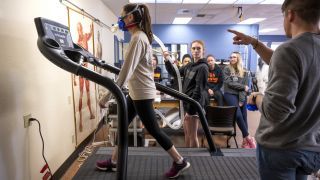 Health and Exercise Sciences students monitor people on treadmills