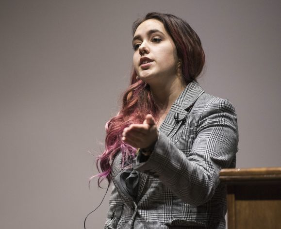 debate team member making speech