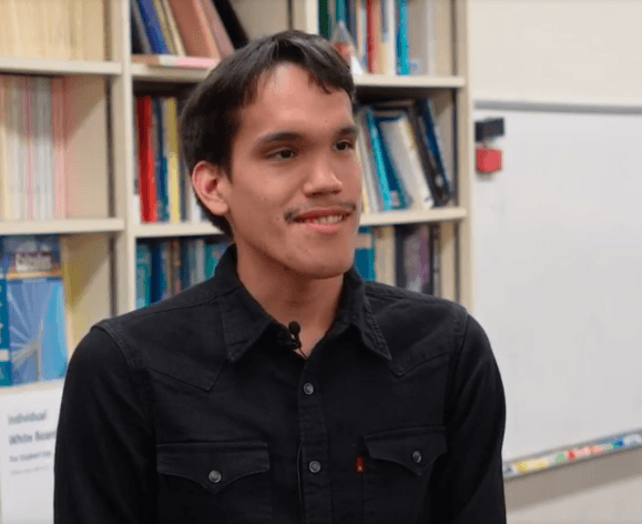 Oscar Avalos, math major, in a study room.